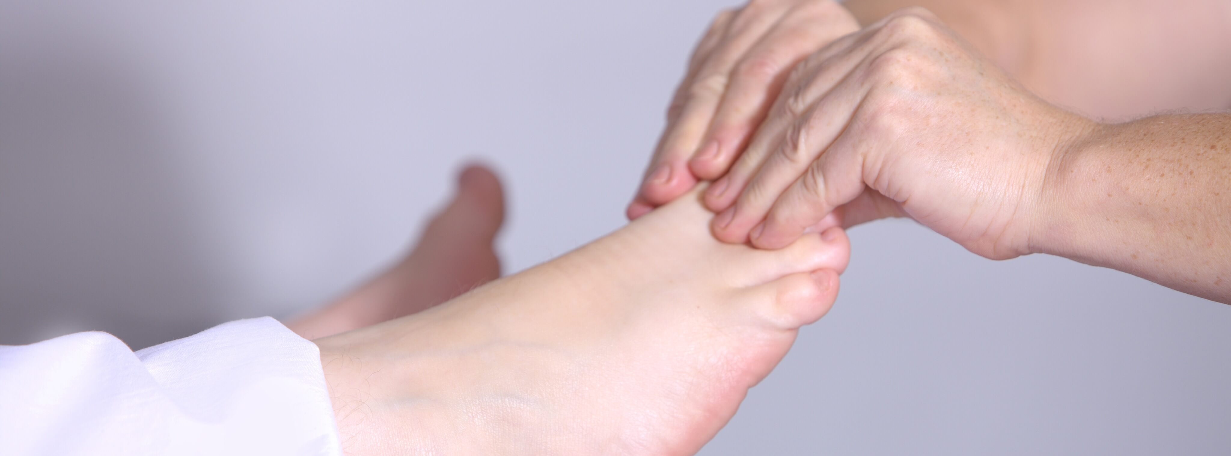 Podiatrist treating feet